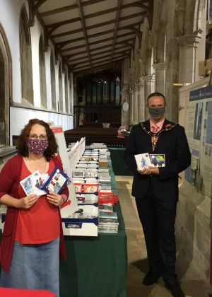 Mayor opening charity christmas cards at St James Church