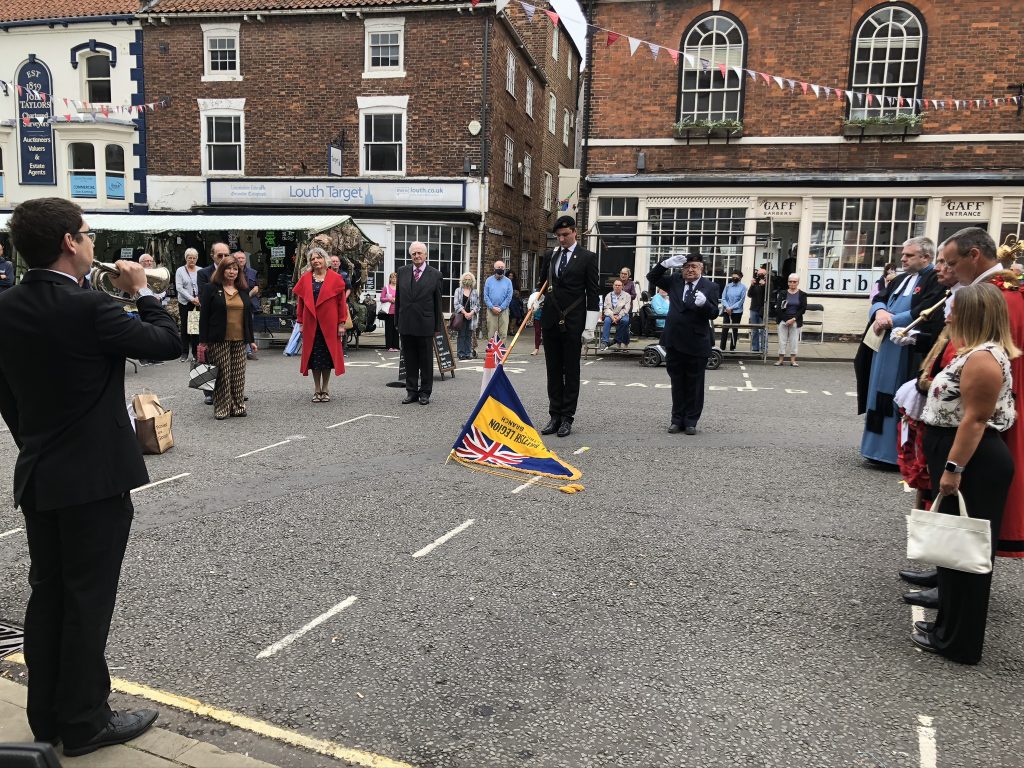 the Royal British Legion lowered the Standard in a 2-minute silence following the Last Post played by Adam Barter.