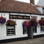 Whyte Swanne with hanging baskets